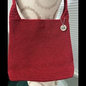 The Sak Woven Crochet Shoulder bag in red.